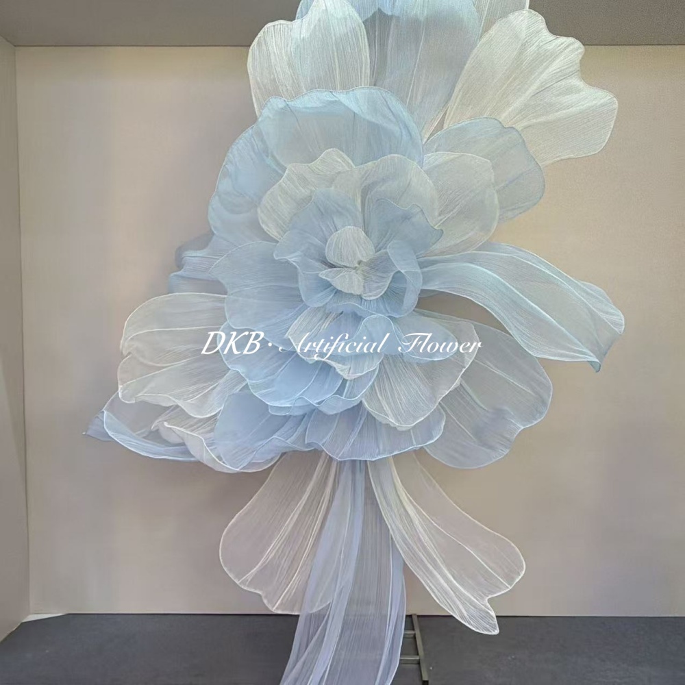 dreamy baby blue organza giant flower installation.jpg